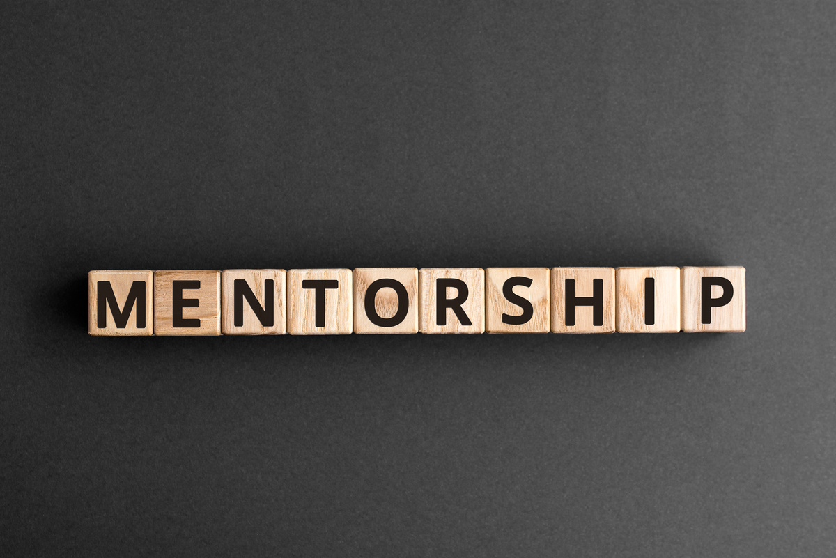 Mentorship - word from wooden blocks with letters